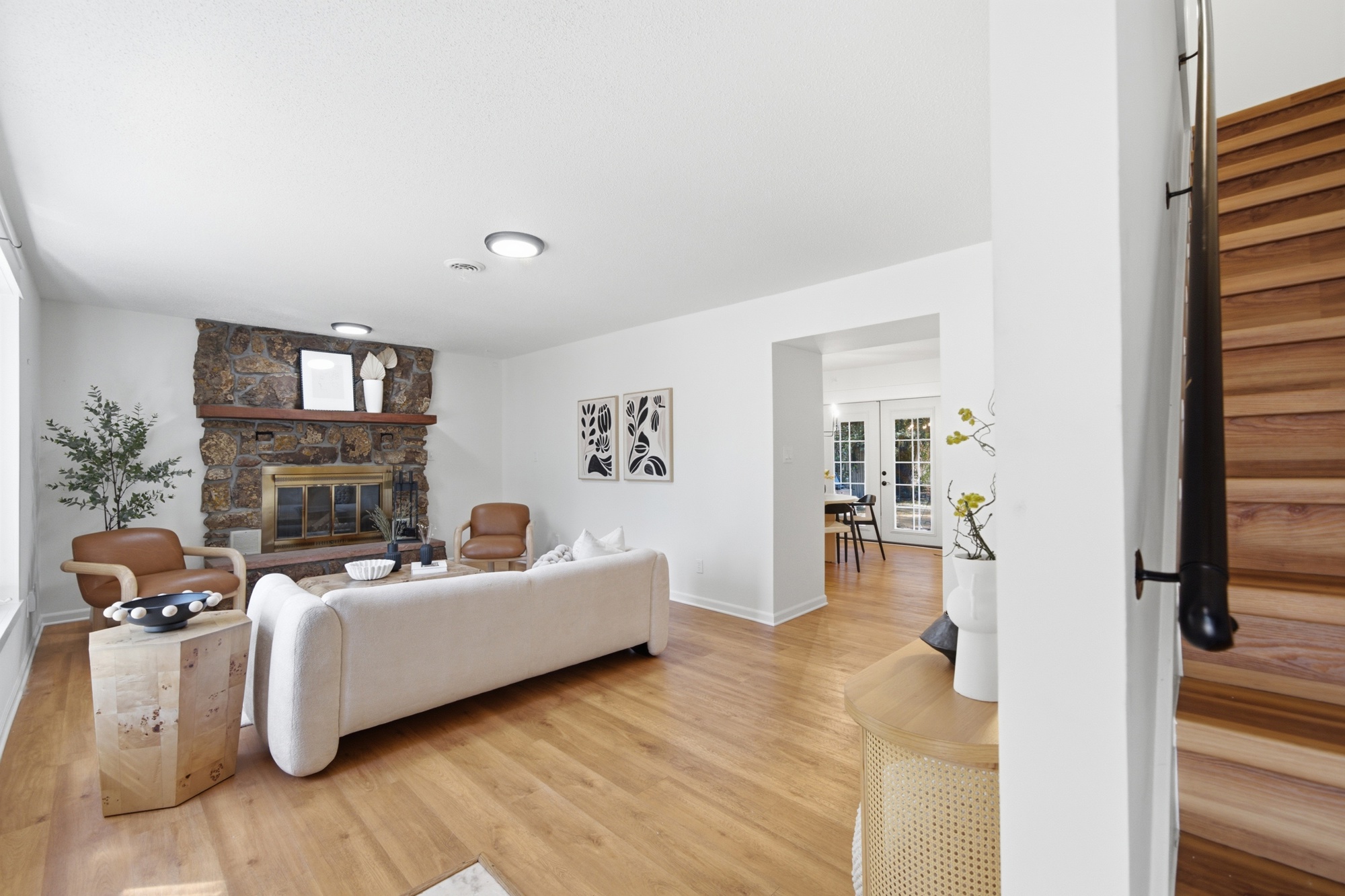 Living room with stone fireplace